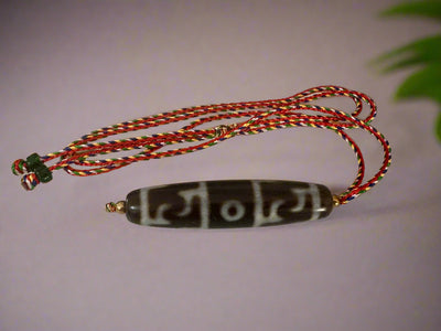 Guru Rinpoche Three Eyed Dzi Bead